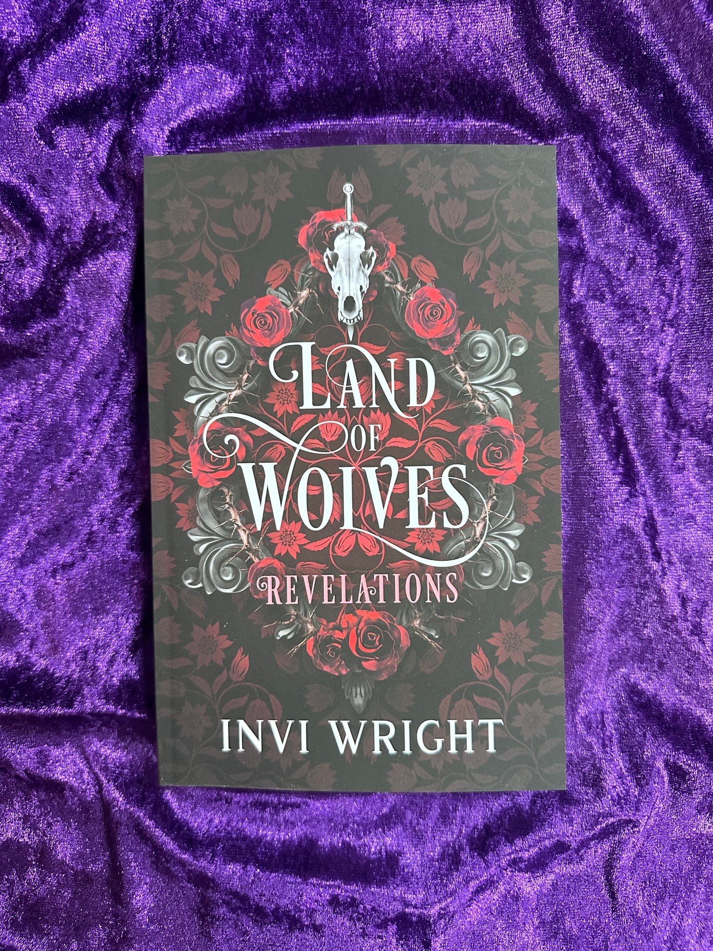 Land of Wolves Revelations - Invi Wright
